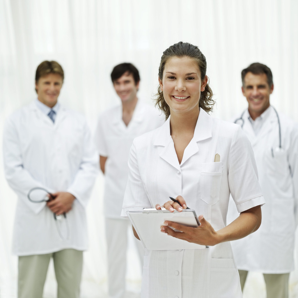 Female Nurse and a Group of Medical Personnel